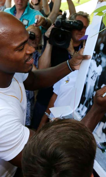 Adrian Peterson 'definitely happy' to be back with Vikings